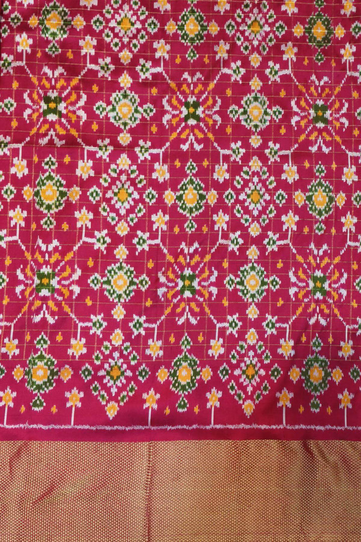 Ikat pure silk saree in bottle green with zari checks