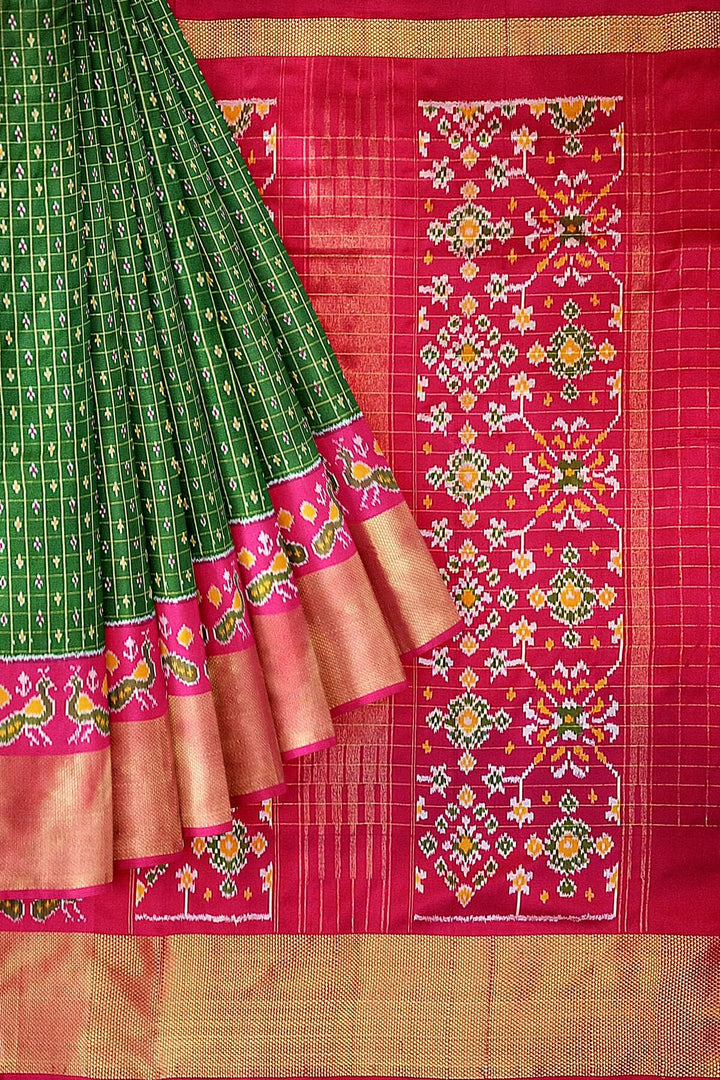 Ikat pure silk saree in bottle green with zari checks