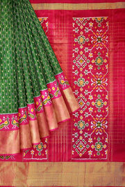 Ikat pure silk saree in bottle green with zari checks