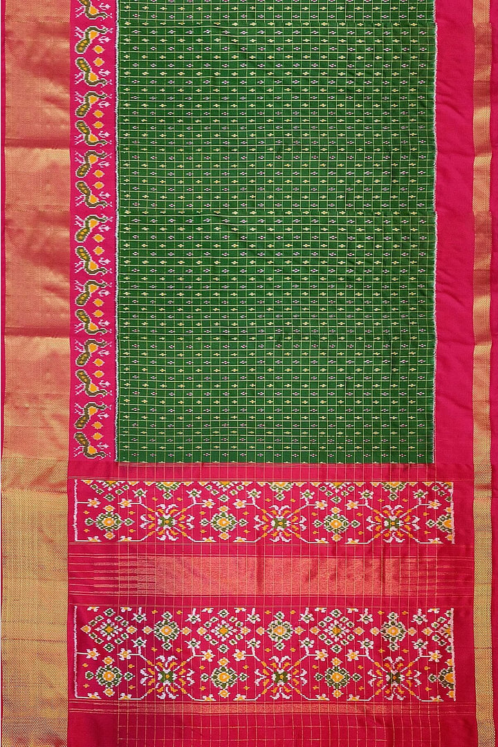 Ikat pure silk saree in bottle green with zari checks