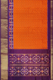 Ikat pure silk saree in orange with zari checks .