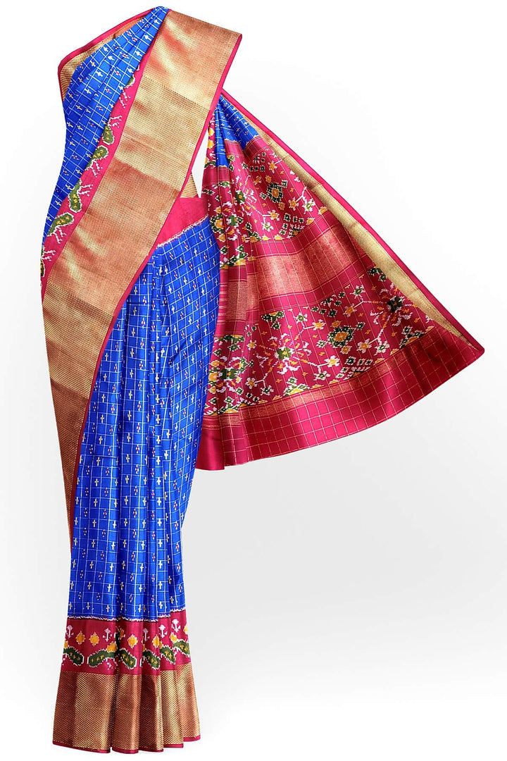 Ikat pure silk saree in blue with zari checks .