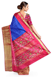 Ikat pure silk saree in blue with zari checks .