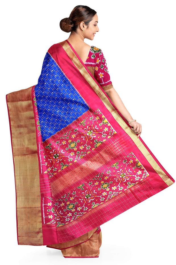 Ikat pure silk saree in blue with zari checks .