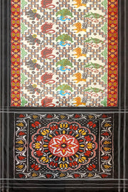 Ikkat pure silk saree in off white with birds & animal motifs.