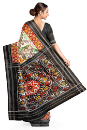 Ikkat pure silk saree in off white with birds & animal motifs.