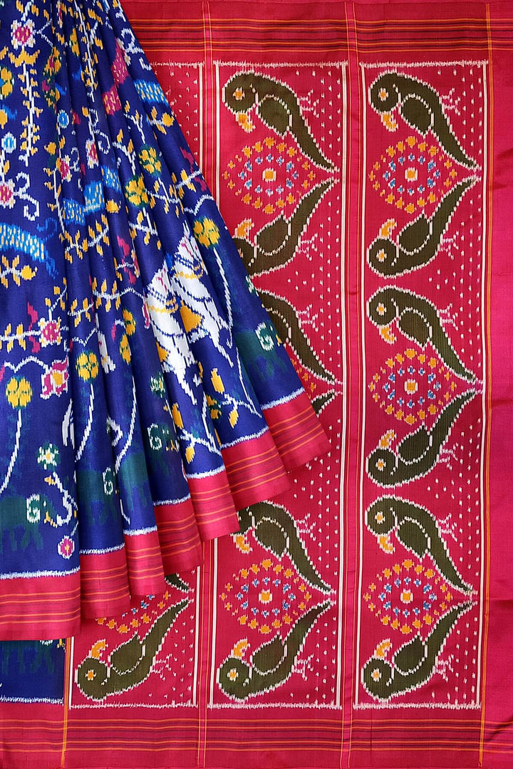 Ikkat pure silk saree in blue with forest pattern