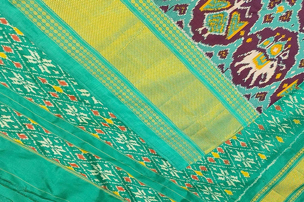 Ikat pure silk saree in purple in narikunj design with a contrast pallu