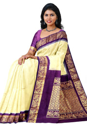 Handwoven Kanchi pure silk saree in off white and a contrast pallu in purple.