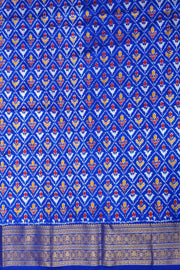 Handwoven ikat pure silk saree in rust colour with geometric pattern