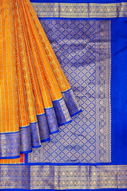 Handwoven ikat pure silk saree in rust colour with geometric pattern