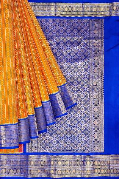 Handwoven ikat pure silk saree in rust colour with geometric pattern