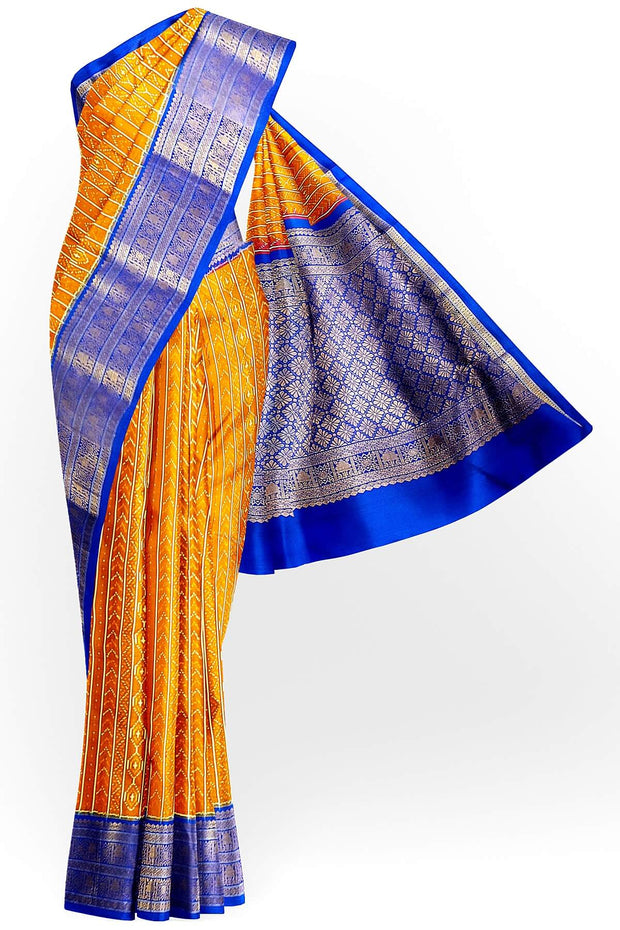 Handwoven ikat pure silk saree in rust colour with geometric pattern