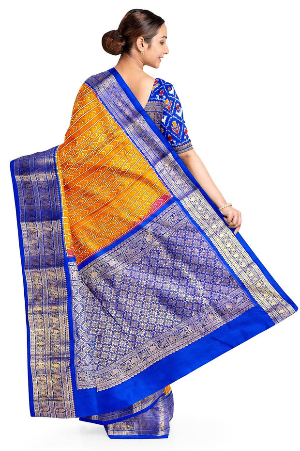 Handwoven ikat pure silk saree in rust colour with geometric pattern