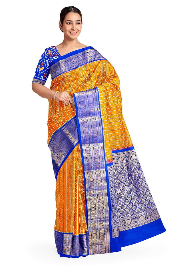 Handwoven ikat pure silk saree in rust colour with geometric pattern
