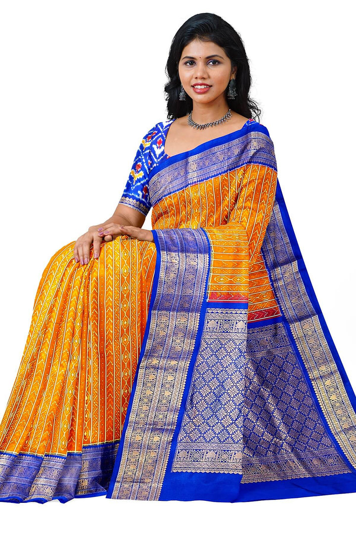Handwoven ikat pure silk saree in rust colour with geometric pattern
