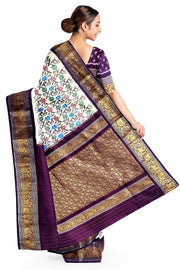 Handwoven Ikkat pure silk saree in  white with floral pattern