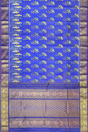 Handwoven Ikkat weave on a  fine zari striped pure silk saree in berry blue .