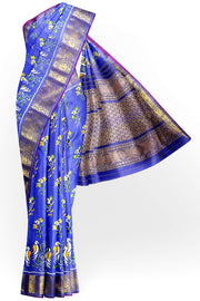Handwoven Ikkat weave on a  fine zari striped pure silk saree in berry blue .