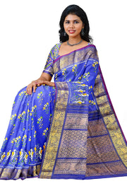 Handwoven Ikkat weave on a  fine zari striped pure silk saree in berry blue .