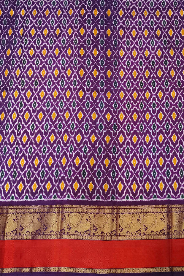 Handwoven ikat pure silk saree in multicolour with zari checks and small floral woven motifs .