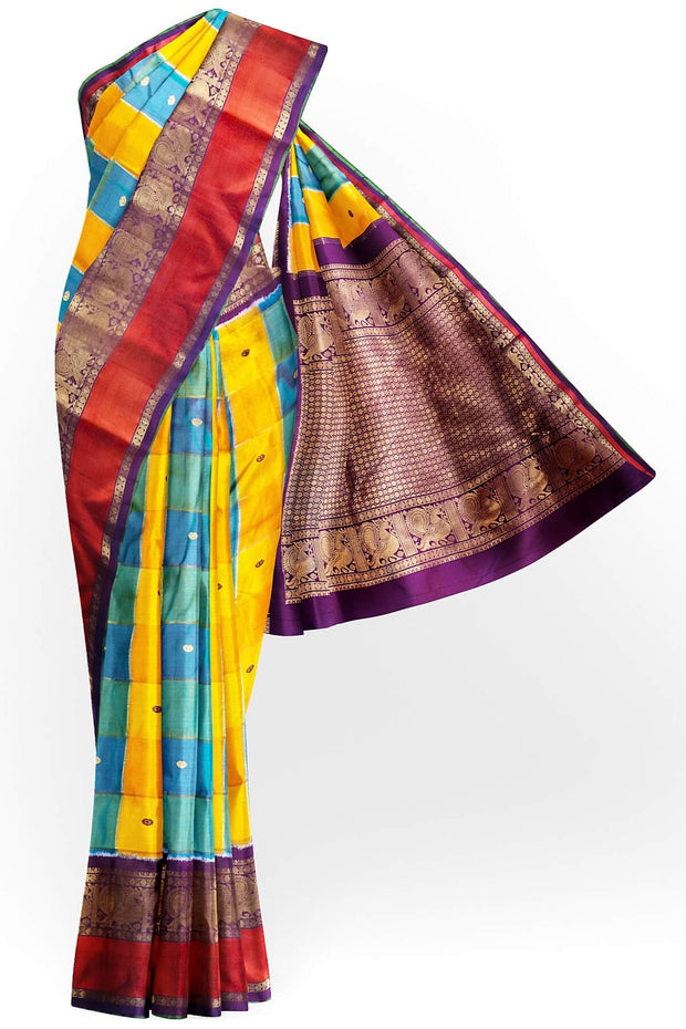 Handwoven ikat pure silk saree in multicolour with zari checks and small floral woven motifs .