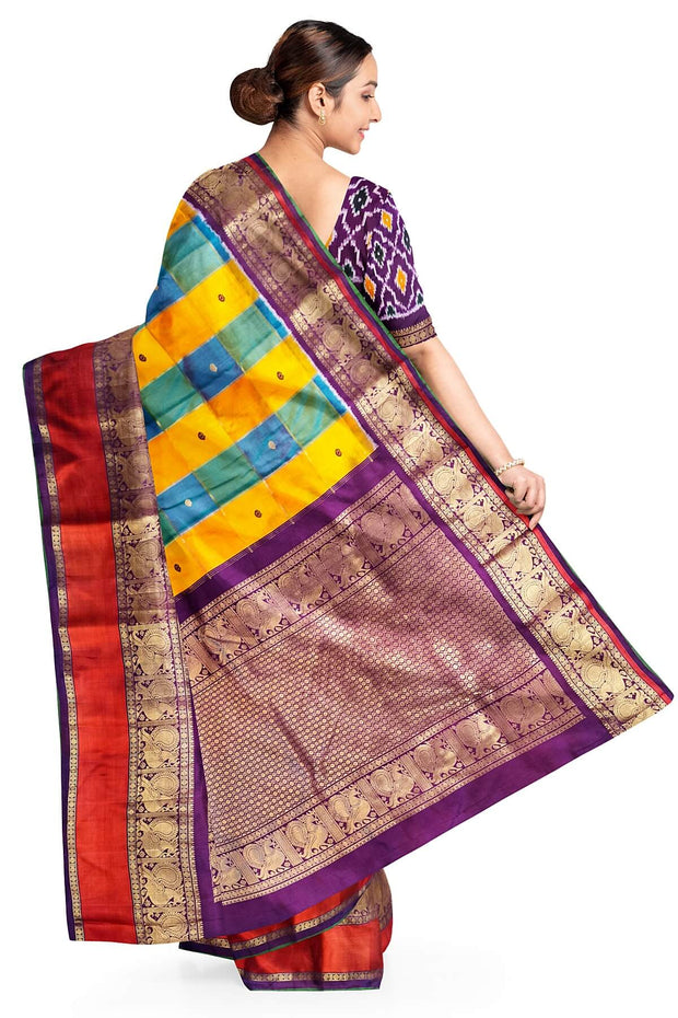 Handwoven ikat pure silk saree in multicolour with zari checks and small floral woven motifs .