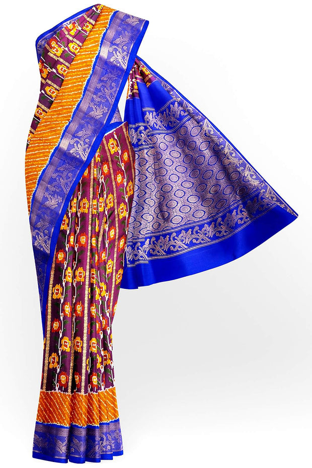 Handwoen ikat pure silk saree in purple with floral vines.