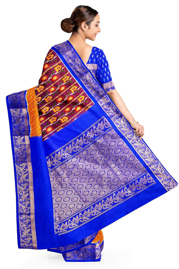 Handwoen ikat pure silk saree in purple with floral vines.