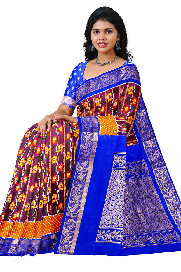 Handwoen ikat pure silk saree in purple with floral vines.