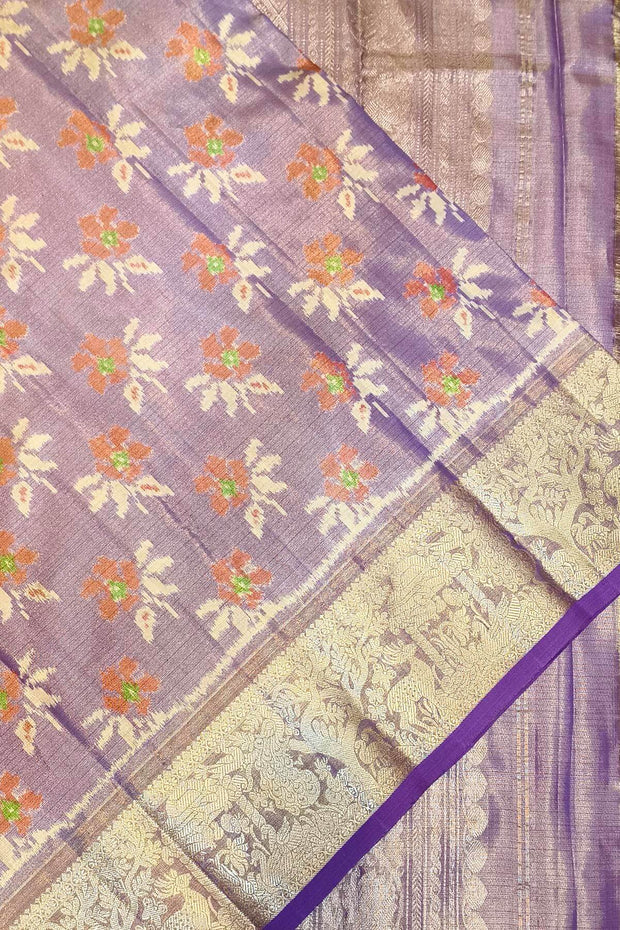Handwoven Ikat pure  silk tissue saree in beautiful lavender with floral motifs