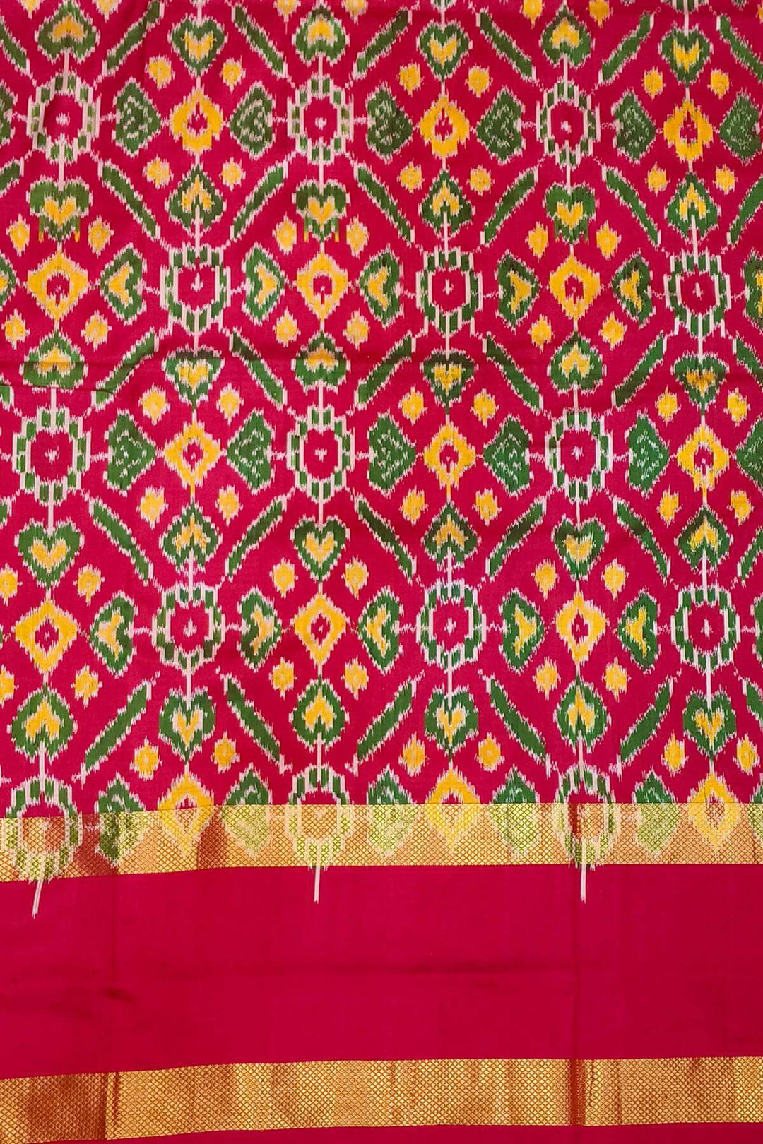 Handwoven Ikat silk saree in pink  in fine checks