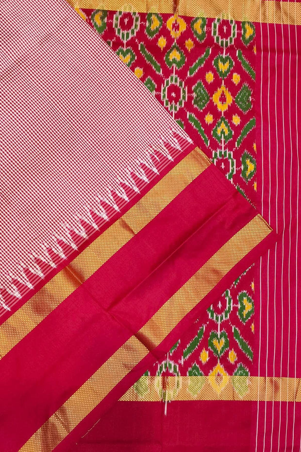 Handwoven Ikat silk saree in pink  in fine checks