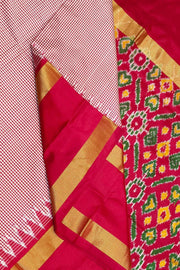 Handwoven Ikat silk saree in pink  in fine checks