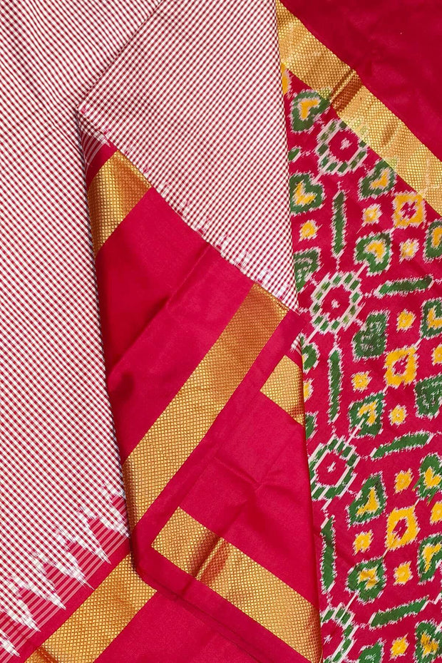 Handwoven Ikat silk saree in pink  in fine checks