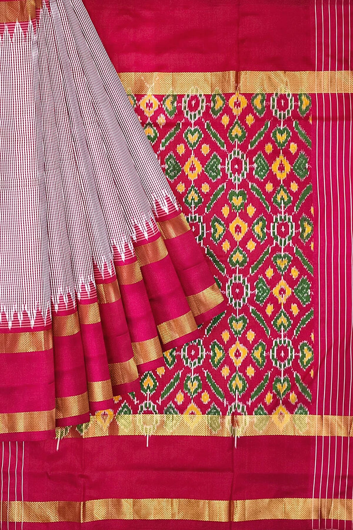 Handwoven Ikat silk saree in pink  in fine checks
