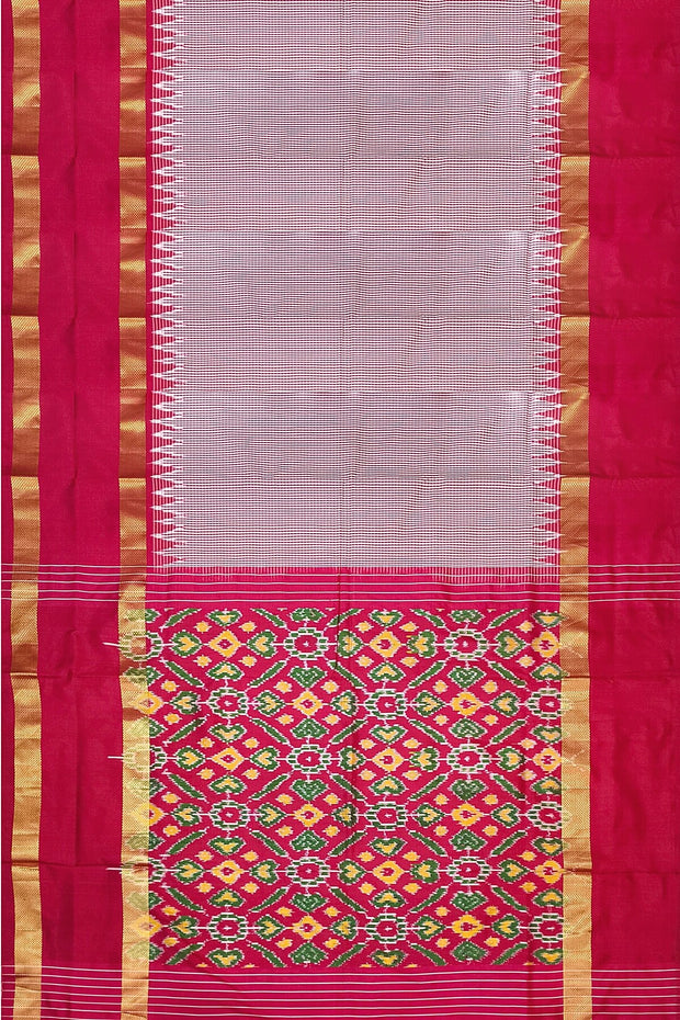 Handwoven Ikat silk saree in pink  in fine checks