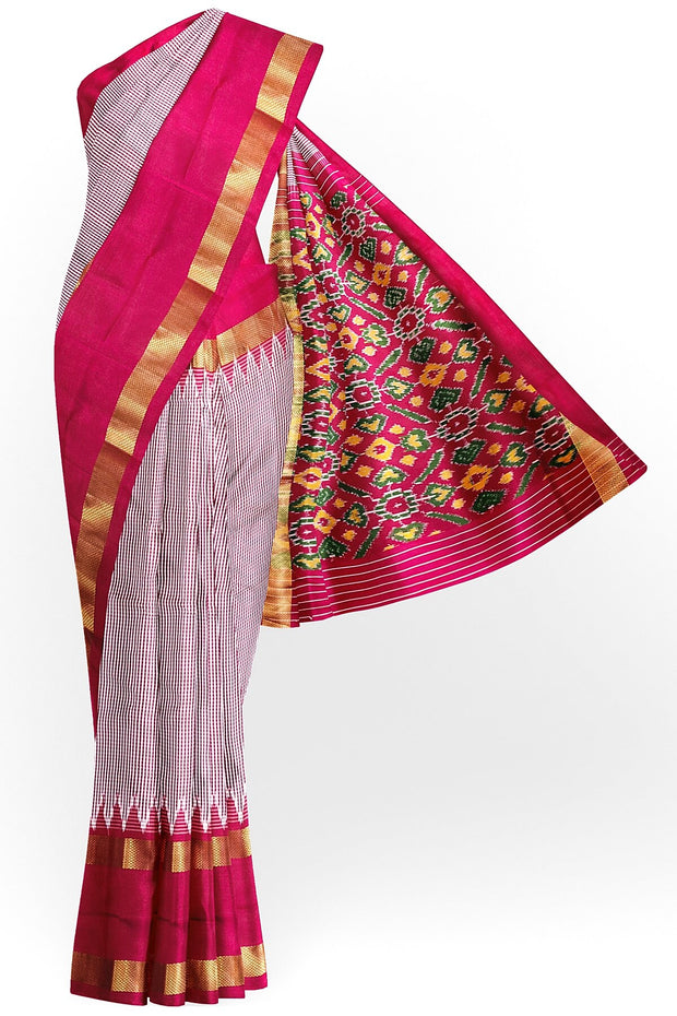 Handwoven Ikat silk saree in pink  in fine checks