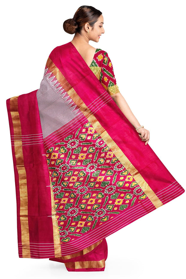 Handwoven Ikat silk saree in pink  in fine checks