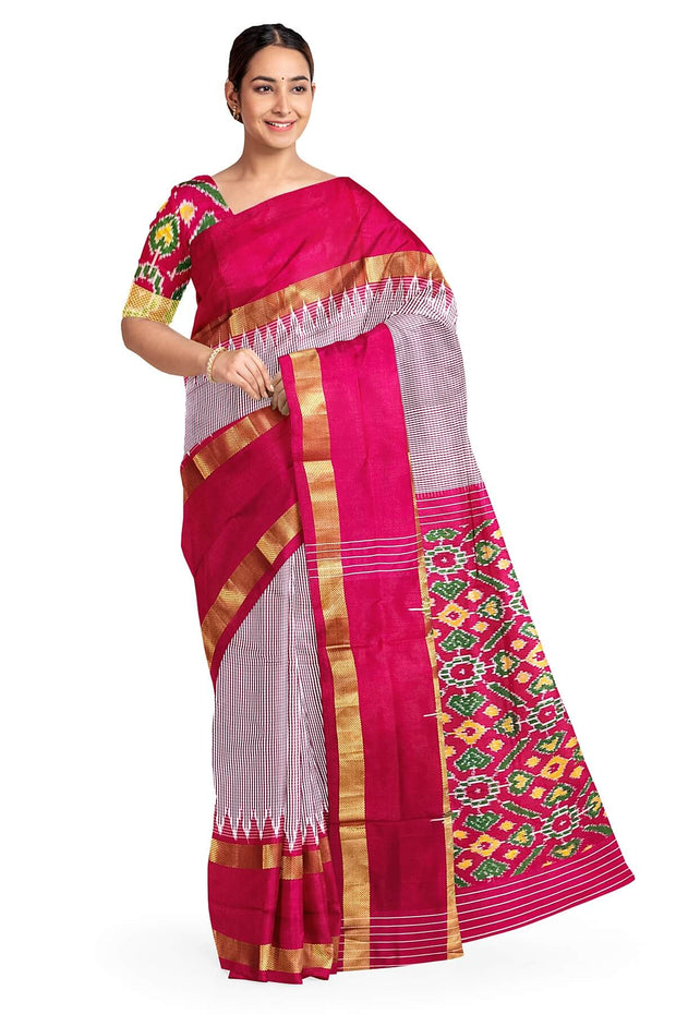Handwoven Ikat silk saree in pink  in fine checks