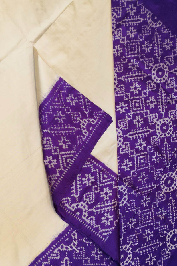 Handwoven Ikat pure silk saree in off white & purple