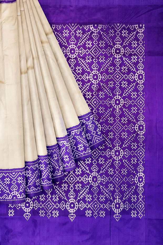 Handwoven Ikat pure silk saree in off white & purple