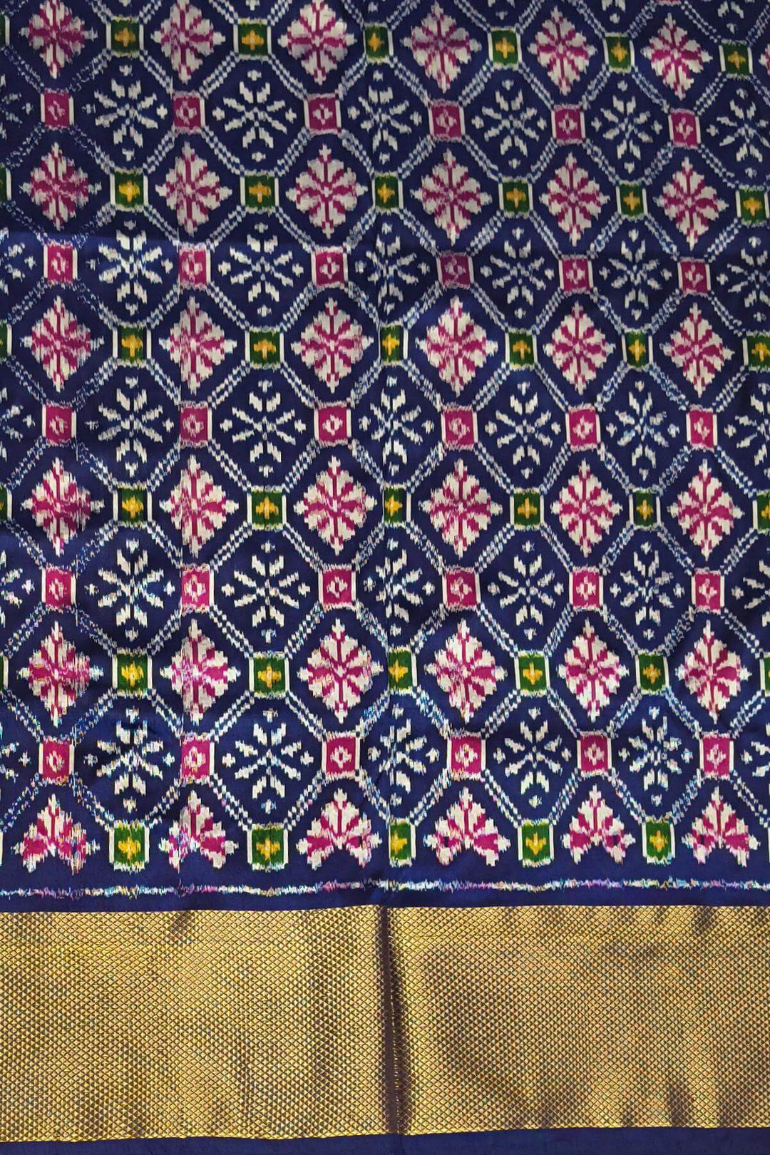 Ikkat pure silk saree in off white with floral motifs