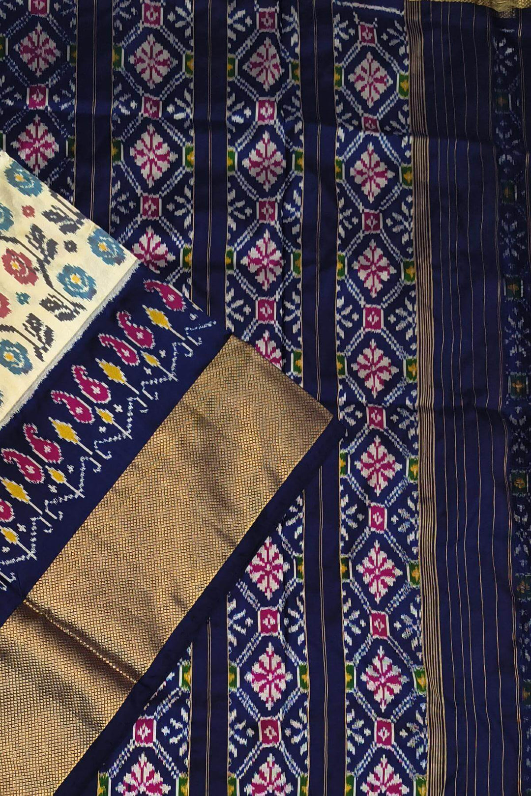 Ikkat pure silk saree in off white with floral motifs