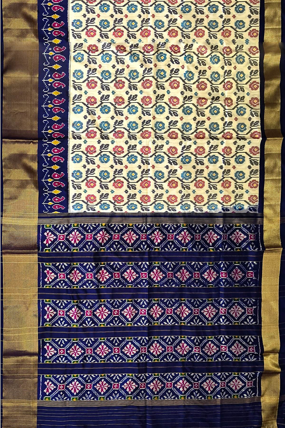 Ikkat pure silk saree in off white with floral motifs