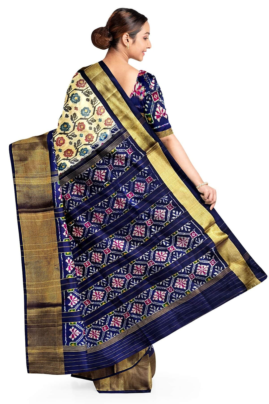 Ikkat pure silk saree in off white with floral motifs