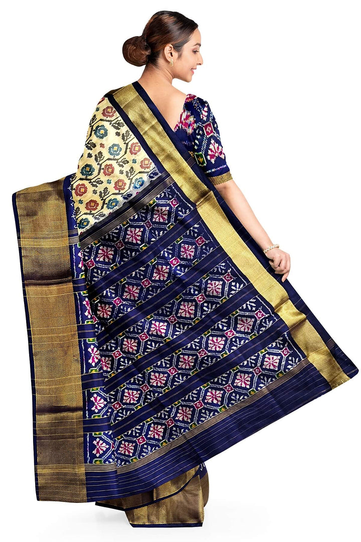 Ikkat pure silk saree in off white with floral motifs
