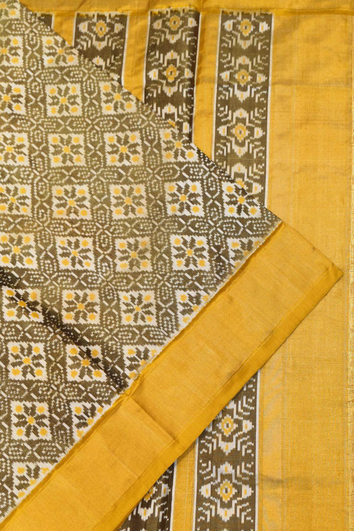 Ikkat  pure silk tissue saree in yellow & off white