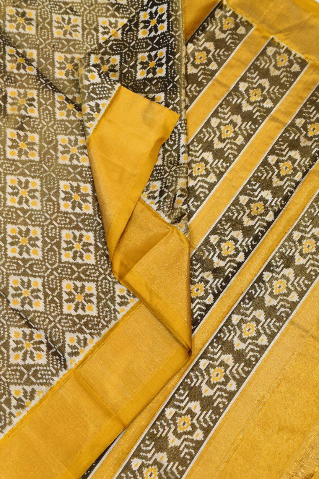 Ikkat  pure silk tissue saree in yellow & off white