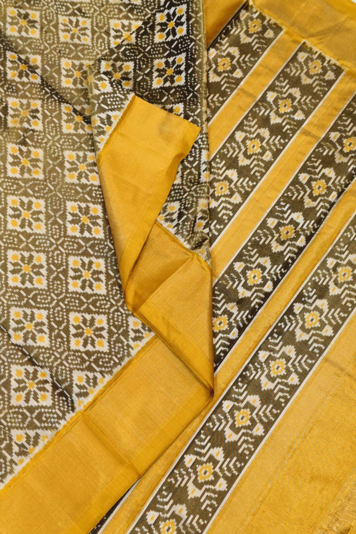 Ikkat  pure silk tissue saree in yellow & off white